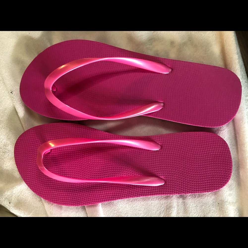 Flip Flops bright pink. So 7/8  new